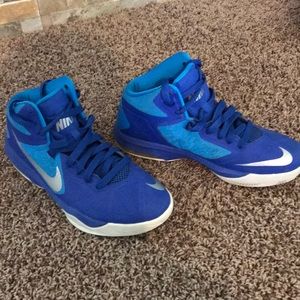 Colorful blue Nike basketball shoes.